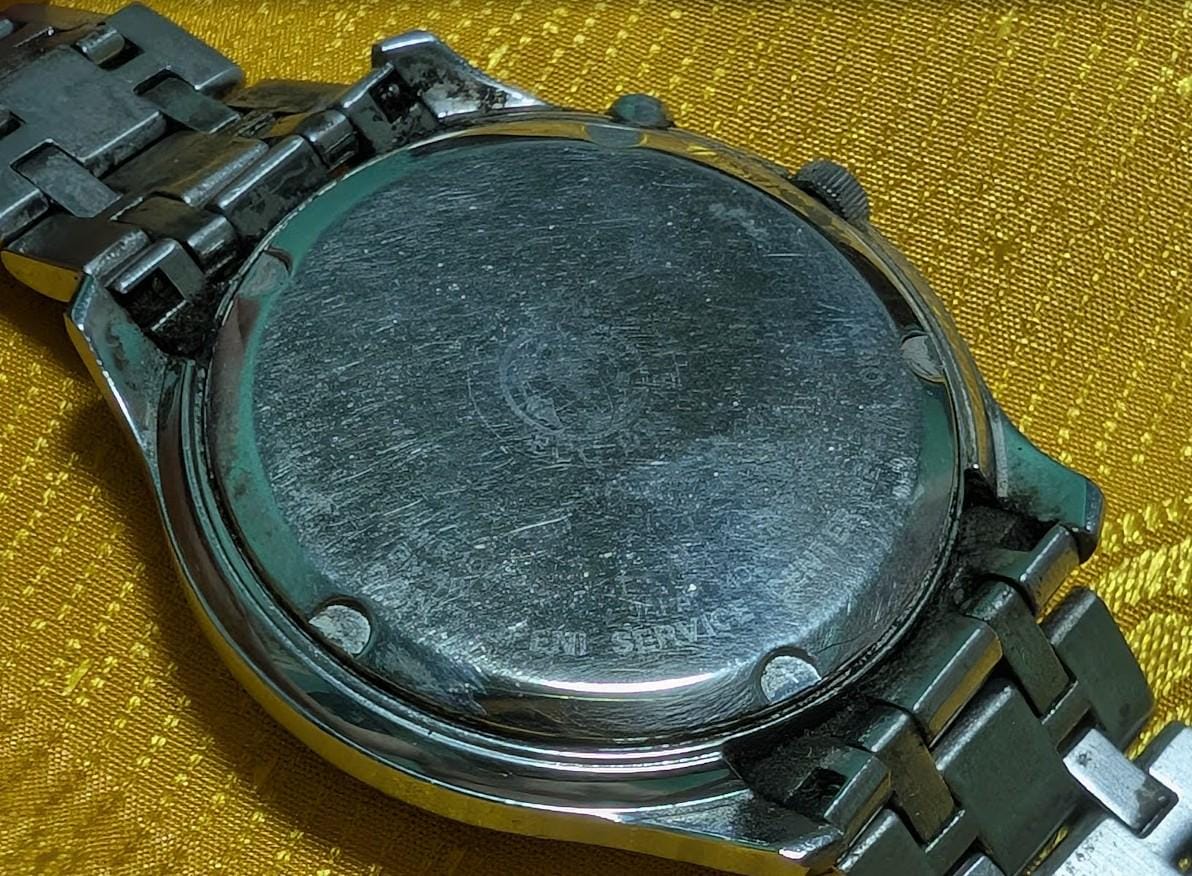 Vintage Pre-Owned Citizen Eco Drive Radio Controlled H415-S055933 Watch 39mm Japan Working Silver Dial Rare