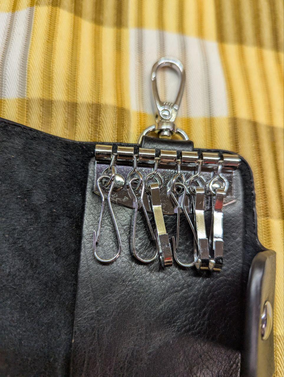Pre-Owned Compact woven leather key holder with suede for 6 keys
