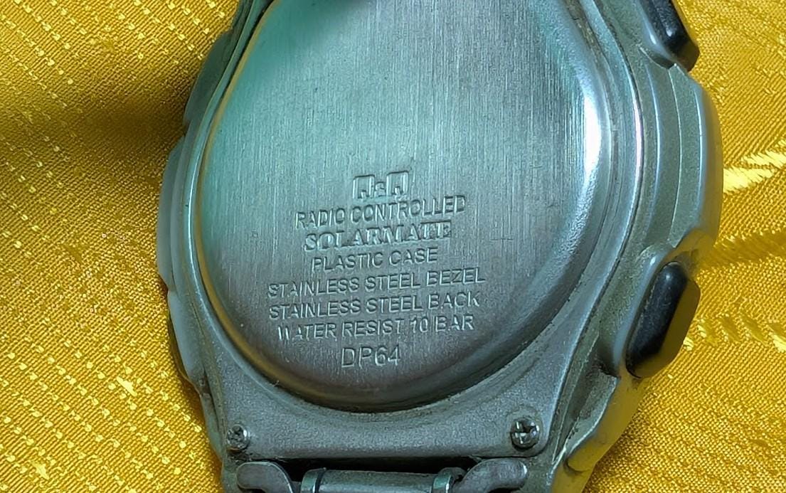 Vintage Pre-Owned QandQ Solarmate P62 Radio Controlled Solar Digital Watch Citizen Japan Retro Steel Watch