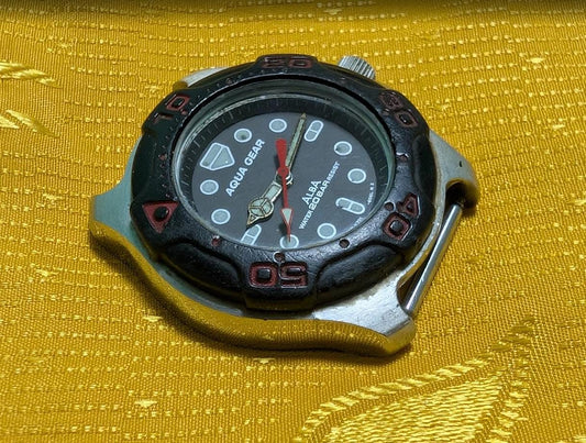 Rare Vintage Pre-Owned ALBA “Aqua Gear” V701-6050 – Diver Style 20BAR . Rotating Bezel.Case 33mm.New battery