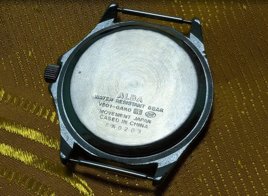 Vintage Pre-Owned ALBA V501-0AK0 Field Style Quartz Watch 37mm Military Dial New Battery Working Japan Movement.