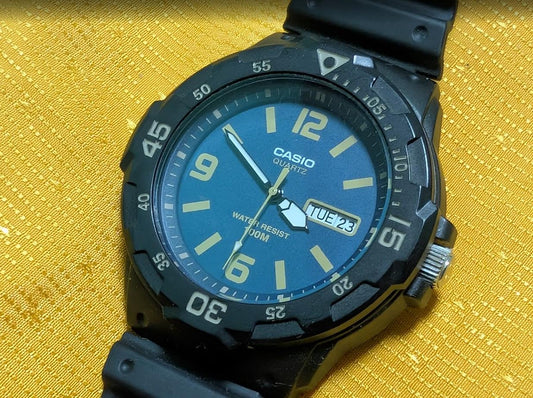 Vintage Pre-Owned Casio MRW-200H Blue Dial Diver Style Watch Rotating Bezel Early No Letter After H Version.New battery