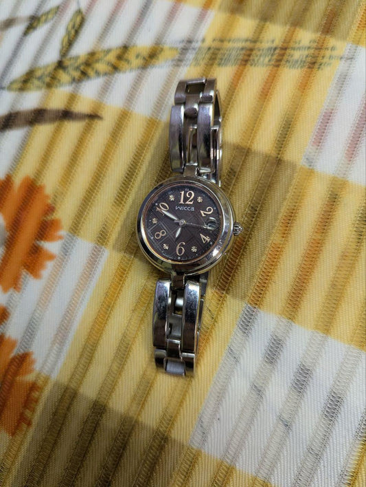 Vintage Pre-Owned Citizen Wicca H0F8 Solar Radio Controlled Women’s Watch Brown Dial Date Stainless Steel Bracelet Japan