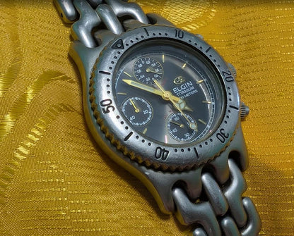 Vintage Pre-Owned Elgin FK-617-MA Titanium Chronograph Watch Green Dial 200M 37mm Rare 1990s Quartz Wristwatch