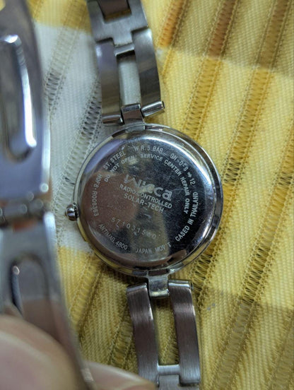 Vintage Pre-Owned Citizen Wicca H0F8 Solar Radio Controlled Women’s Watch Brown Dial Date Stainless Steel Bracelet Japan