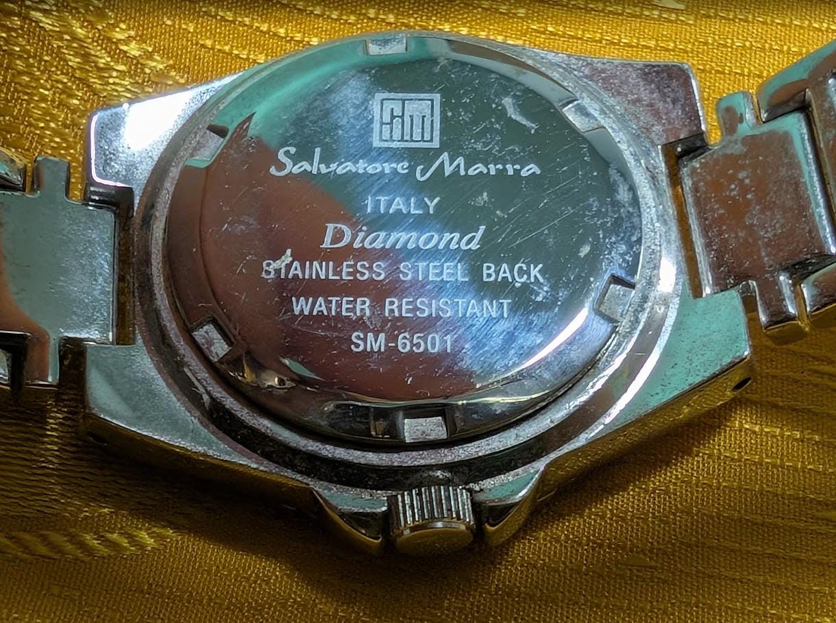 Salvatore Marra SM6501 Vintage Pre-Owned Women Watch 100 Diamonds Crystal Bezel Mother of Pearl Dial 33mm Case Steel Bracelet Elegant