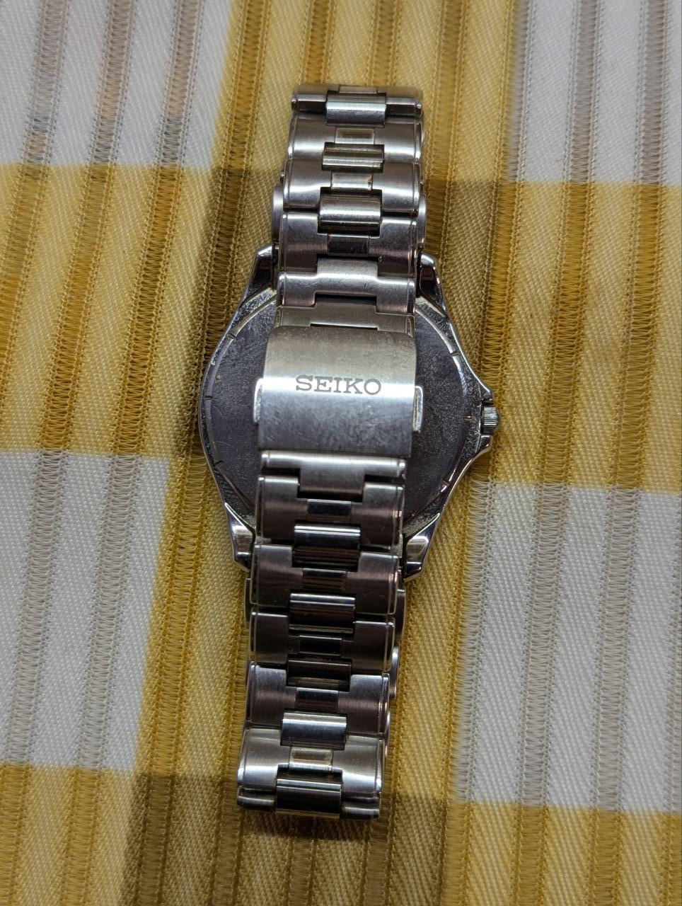 Vintage Pre-Owned Rare Seiko Dolce 8J41-0AF1 HAQ Quartz Watch White Textured Dial Stainless Steel Bracelet Japan