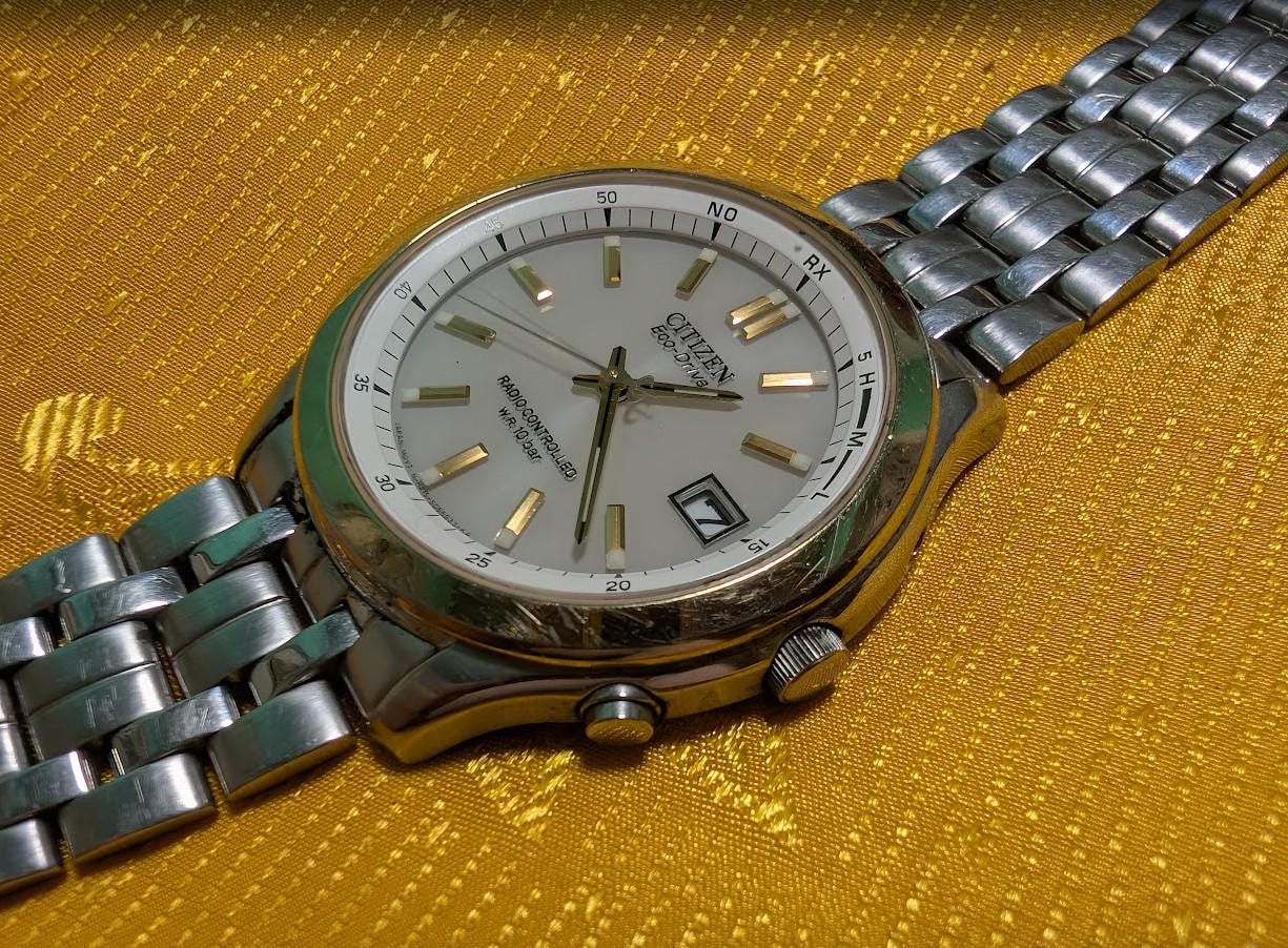 Vintage Pre-Owned Citizen Eco Drive Radio Controlled H415-S055933 Watch 39mm Japan Working Silver Dial Rare