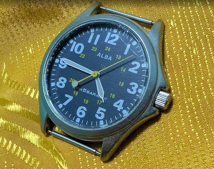 Vintage Pre-Owned ALBA V501-0AK0 Field Style Quartz Watch 37mm Military Dial New Battery Working Japan Movement.