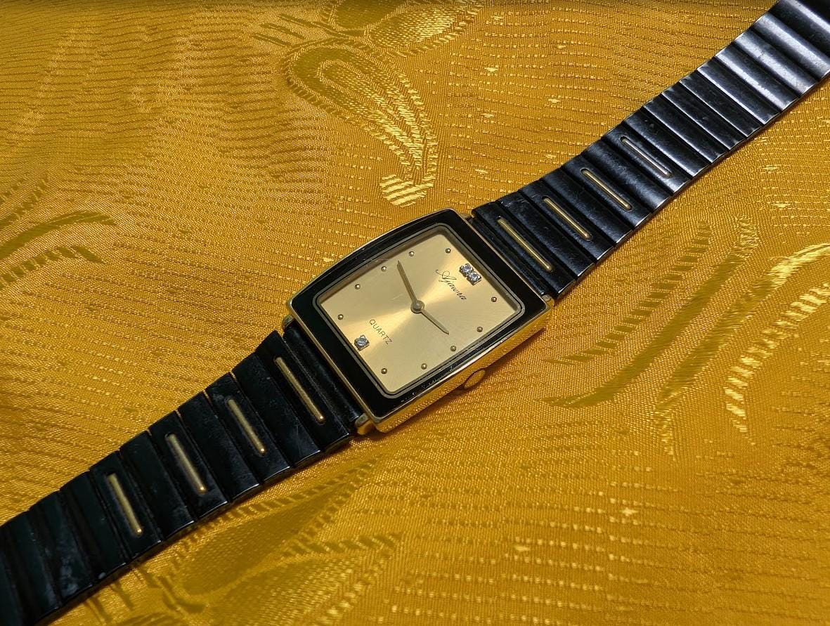 Ajawra Quartz Vintage Pre-Owned Watch A-101M Rectangular Gold Dial Classic Design .case 25mm.New battery