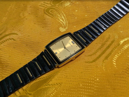 Ajawra Quartz Vintage Pre-Owned Watch A-101M Rectangular Gold Dial Classic Design .case 25mm.New battery