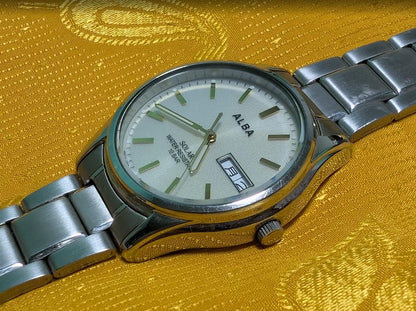 Vintage Pre-Owned Seiko Alba V158-0AX0 Solar Watch 37mm Silver Dial Day Date Stainless Steel Japan Working