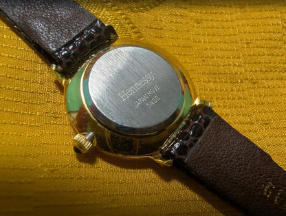 Vintage Pre-Owned Hennessy Paris Women’s Watch – Gold Tone – Premium Strap – Elegant Minimalist