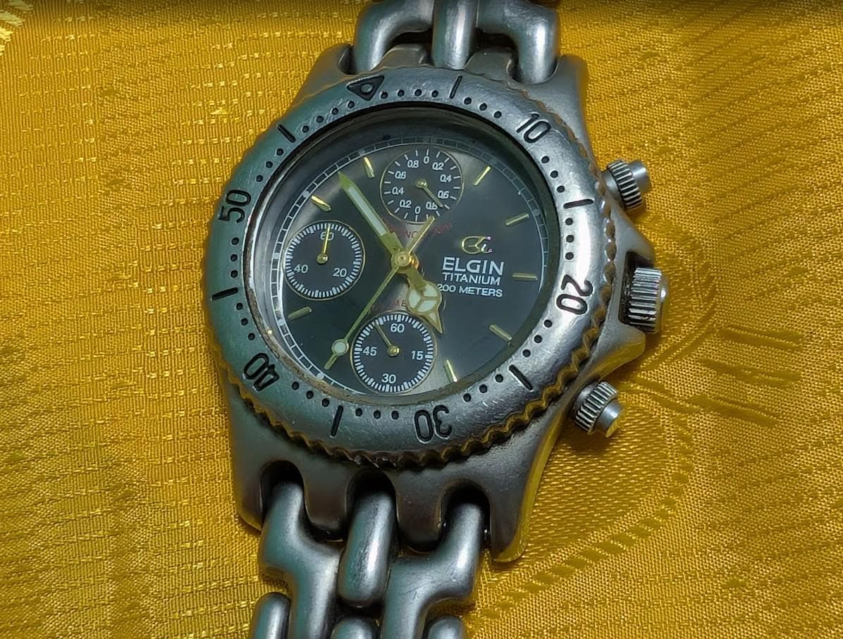 Vintage Pre-Owned Elgin FK-617-MA Titanium Chronograph Watch Green Dial 200M 37mm Rare 1990s Quartz Wristwatch