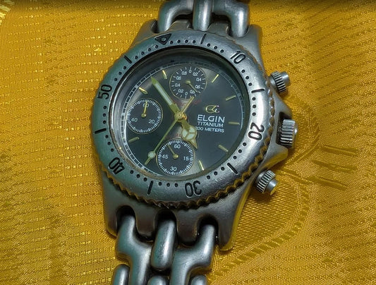 Vintage Pre-Owned Elgin FK-617-MA Titanium Chronograph Watch Green Dial 200M 37mm Rare 1990s Quartz Wristwatch