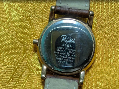 Riki Alba 1N01 KD90 Ladies Watch 24mm Japanese Quartz Watch Maruman Leather Strap Designer Vintage Pre-Owned Watch