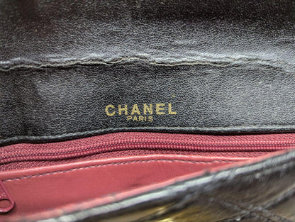 Chanel Paris Quilted Leather Long Wallet Black Envelope Style Snap Closure Vintage Pre-Owned Designer Wallet With Zipper Coin Pocket
