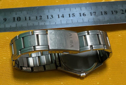 Vintage Pre-Owned Seiko Alba VX43-0AG0 Kanji Titanium Quartz Watch Japan Day Date Men's Watch Working Rare