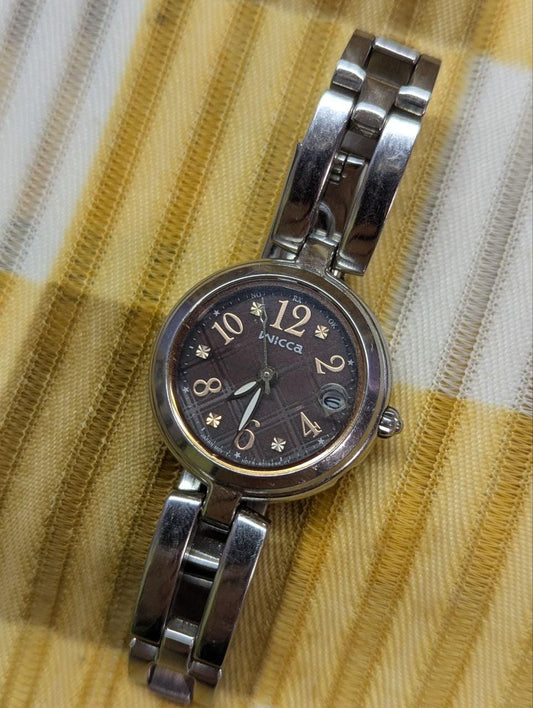 Vintage Pre-Owned Citizen Wicca H0F8 Solar Radio Controlled Women’s Watch Brown Dial Date Stainless Steel Bracelet Japan