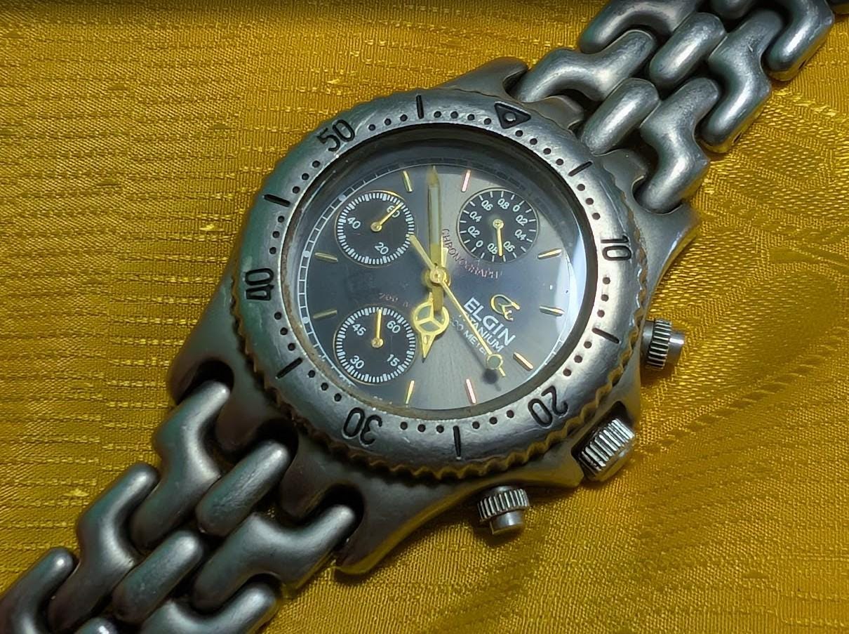 Vintage Pre-Owned Elgin FK-617-MA Titanium Chronograph Watch Green Dial 200M 37mm Rare 1990s Quartz Wristwatch