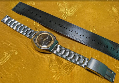 Rare Vintage Pre-Owned Ricoh Riquartz Tiger Eye Dial Japan Watch 38mm Day Date Quartz Steel Bracelet Working Condition