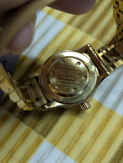 Pre-Owned Nixon The 38-20 Gold Tone Stainless Steel Watch 200M Women’s – Not Working – For Repair