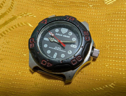 Rare Vintage Pre-Owned ALBA “Aqua Gear” V701-6050 – Diver Style 20BAR . Rotating Bezel.Case 33mm.New battery