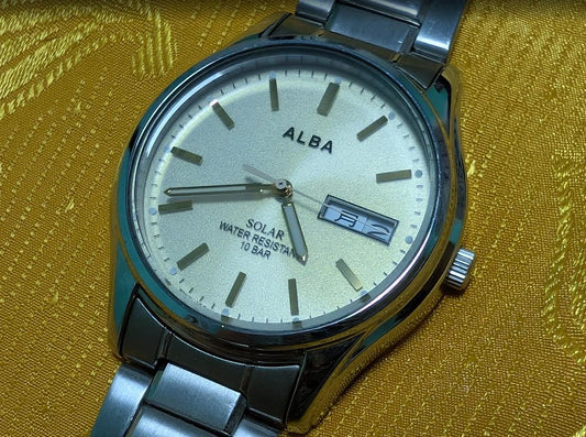 Vintage Pre-Owned Seiko Alba V158-0AX0 Solar Watch 37mm Silver Dial Day Date Stainless Steel Japan Working