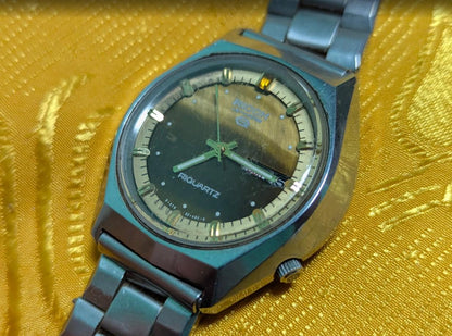 Rare Vintage Pre-Owned Ricoh Riquartz Tiger Eye Dial Japan Watch 38mm Day Date Quartz Steel Bracelet Working Condition