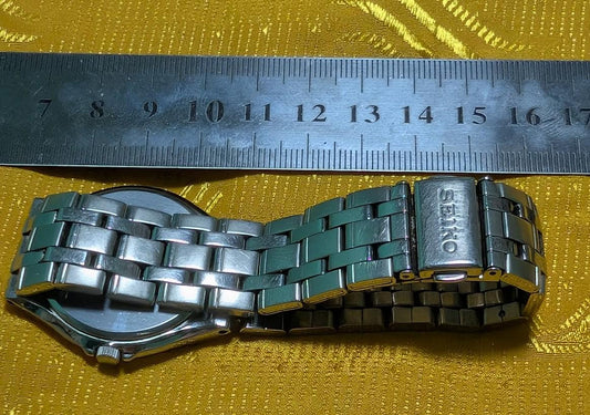 Vintage Pre-Owned Seiko 7N01-0DM0 Minimalist Black Dial Watch 35mm Slim Stainless Steel Quartz Working Japan