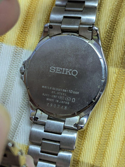 Vintage Pre-Owned Rare Seiko Dolce 8J41-0AF1 HAQ Quartz Watch White Textured Dial Stainless Steel Bracelet Japan