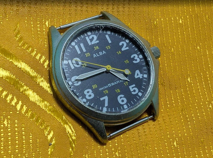Vintage Pre-Owned ALBA V501-0AK0 Field Style Quartz Watch 37mm Military Dial New Battery Working Japan Movement.