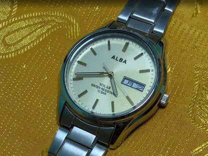 Vintage Pre-Owned Seiko Alba V158-0AX0 Solar Watch 37mm Silver Dial Day Date Stainless Steel Japan Working