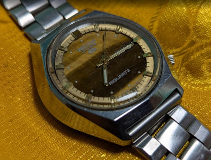 Rare Vintage Pre-Owned Ricoh Riquartz Tiger Eye Dial Japan Watch 38mm Day Date Quartz Steel Bracelet Working Condition