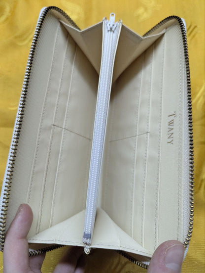Pre-Owned Twany Long Wallet in Cream Ostrich Leather