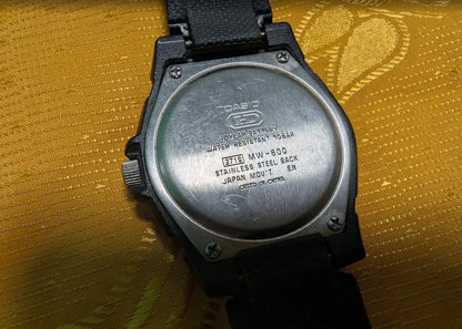 Vintage Pre-Owned Casio MW-600 HD 10 Year Battery WR100M Analog Watch 40mm Black Dial Date Japan Movement Running Video
