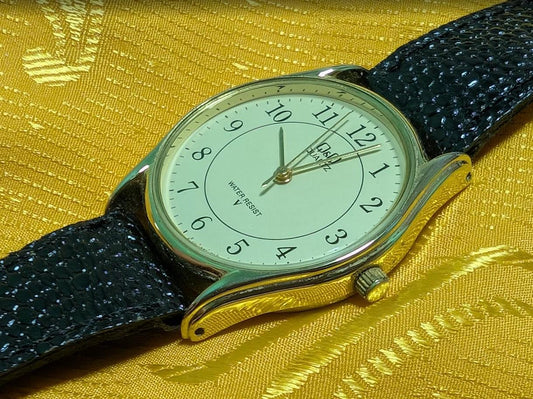 Vintage Pre-Owned Q&Q by Citizen Quartz Japan Watch 33mm Minimalist Dress Watch Black Stingray Style Leather Strap Working