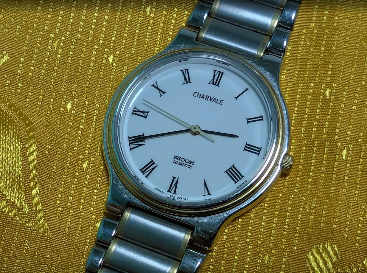 Ricoh Charvale Quartz Watch Roman Dial Mens Watch Stainless Steel Vintage Pre-Owned Japan Watch. case 33mm.NEW Battery