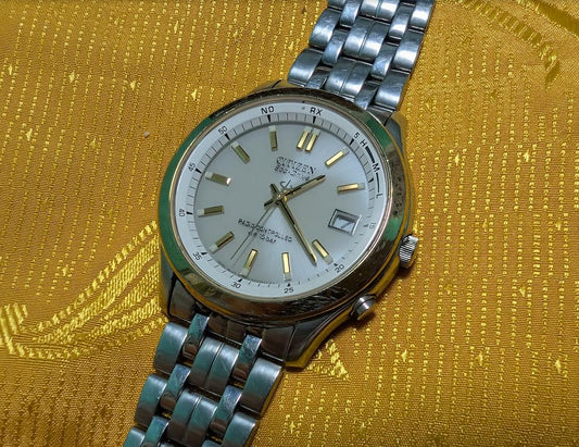 Vintage Pre-Owned Citizen Eco Drive Radio Controlled H415-S055933 Watch 39mm Japan Working Silver Dial Rare