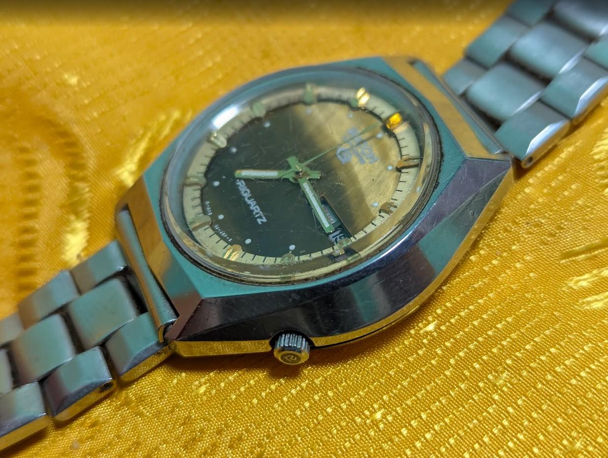 Rare Vintage Pre-Owned Ricoh Riquartz Tiger Eye Dial Japan Watch 38mm Day Date Quartz Steel Bracelet Working Condition
