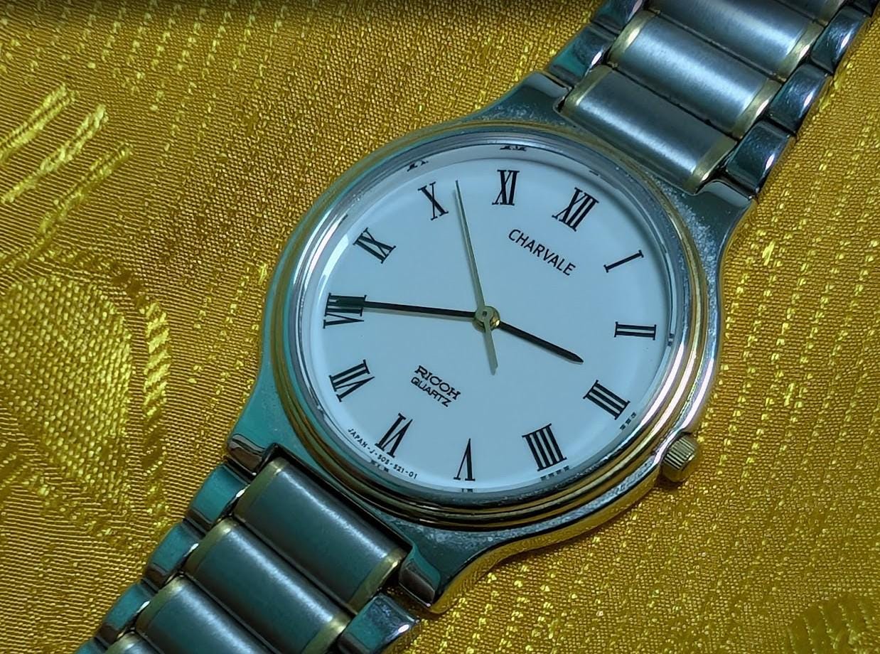Ricoh Charvale Quartz Watch Roman Dial Mens Watch Stainless Steel Vintage Pre-Owned Japan Watch. case 33mm.NEW Battery