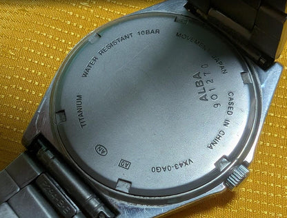 Vintage Pre-Owned Seiko Alba VX43-0AG0 Kanji Titanium Quartz Watch Japan Day Date Men's Watch Working Rare