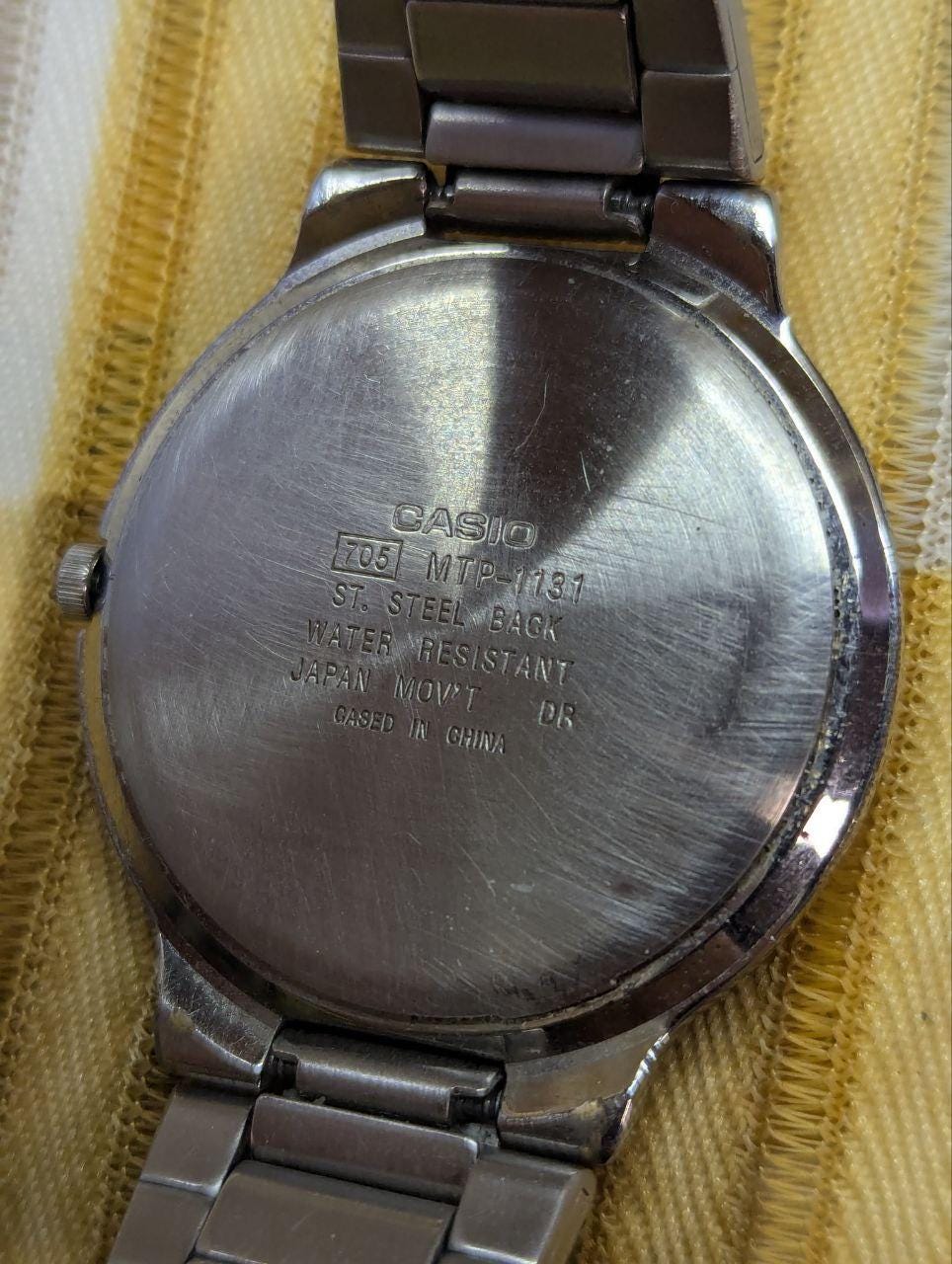 Vintage Pre-Owned Casio MTP-1131 705 Quartz Watch White Dial Stainless Steel Bracelet Japan Movement Men’s Wristwatch