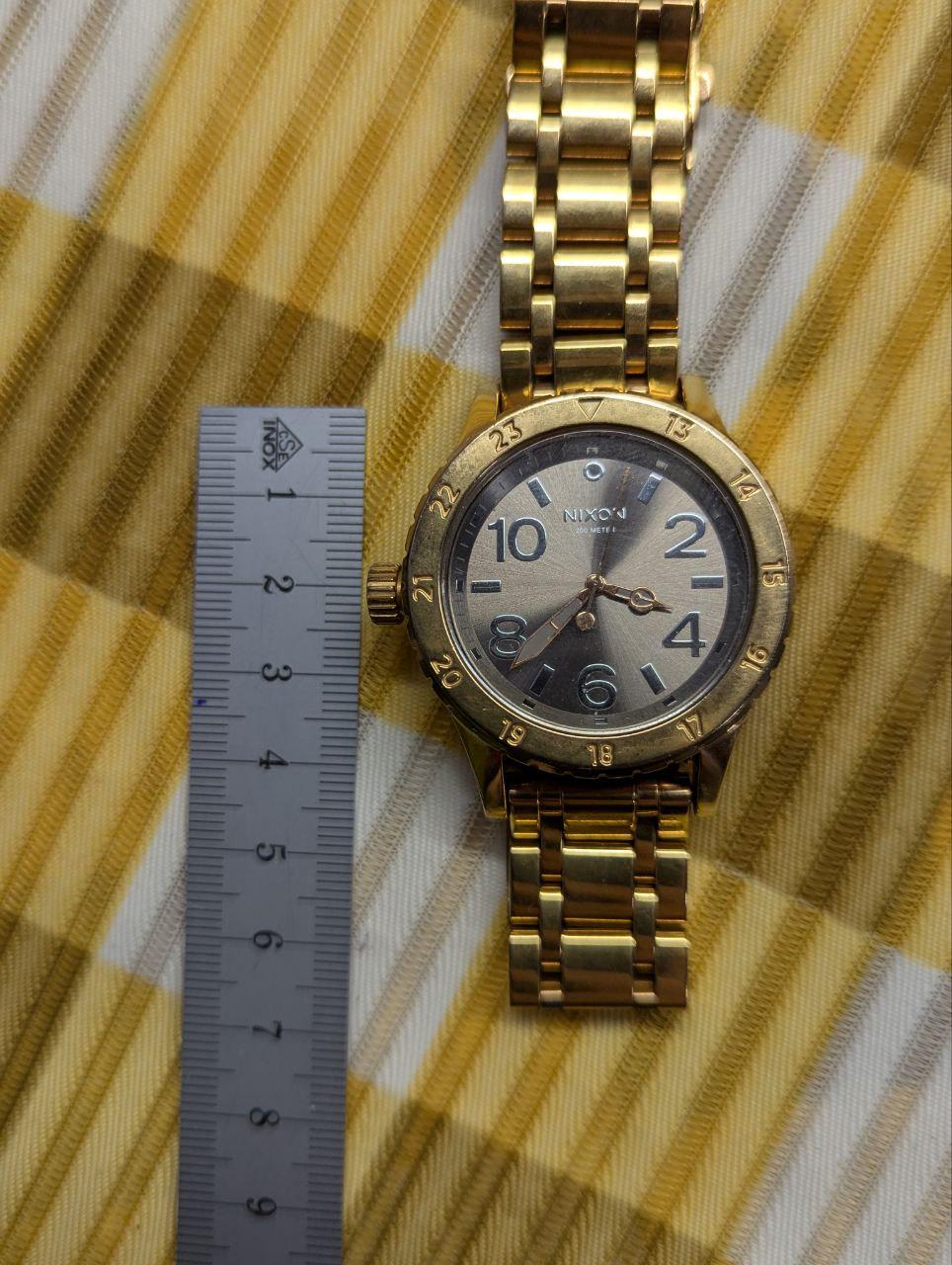 Pre-Owned Nixon The 38-20 Gold Tone Stainless Steel Watch 200M Women’s – Not Working – For Repair