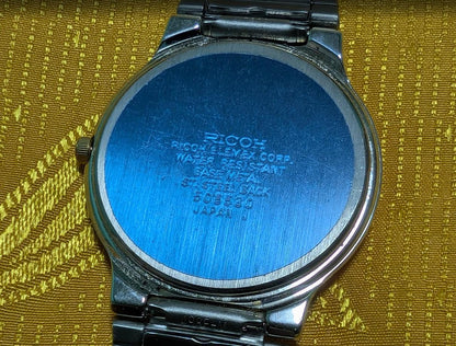 Ricoh Charvale Quartz Watch Roman Dial Mens Watch Stainless Steel Vintage Pre-Owned Japan Watch. case 33mm.NEW Battery