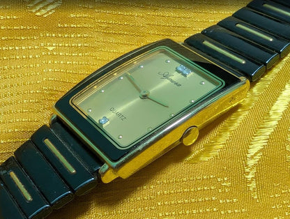 Ajawra Quartz Vintage Pre-Owned Watch A-101M Rectangular Gold Dial Classic Design .case 25mm.New battery