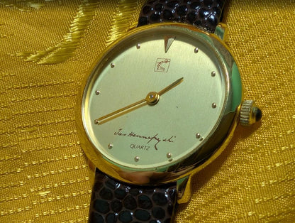 Vintage Pre-Owned Hennessy Paris Women’s Watch – Gold Tone – Premium Strap – Elegant Minimalist