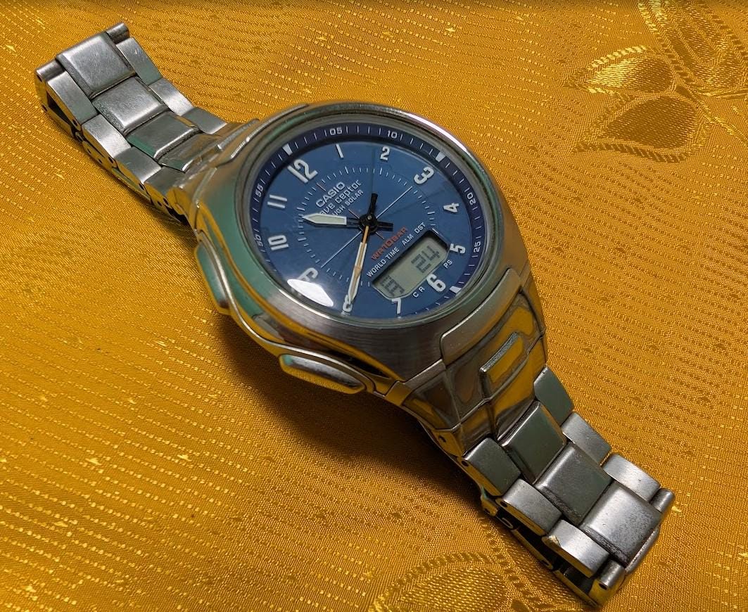 Vintage Pre-Owned Casio Wave Ceptor WVA-430J Tough Solar Blue Dial Radio Controlled Japan Watch Steel Bracelet