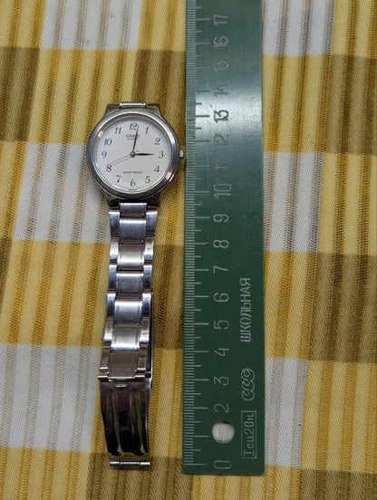 Vintage Pre-Owned Casio MTP-1131 705 Quartz Watch White Dial Stainless Steel Bracelet Japan Movement Men’s Wristwatch