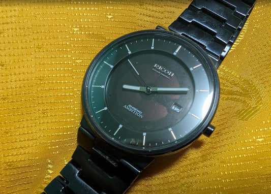 Vintage Pre-Owned Ricoh Shrewd Ambition Solar Energy Black Minimalist Watch Japan